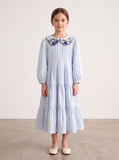 Light blue floral-collar pintuck dress on a girl, knee-covering skirt