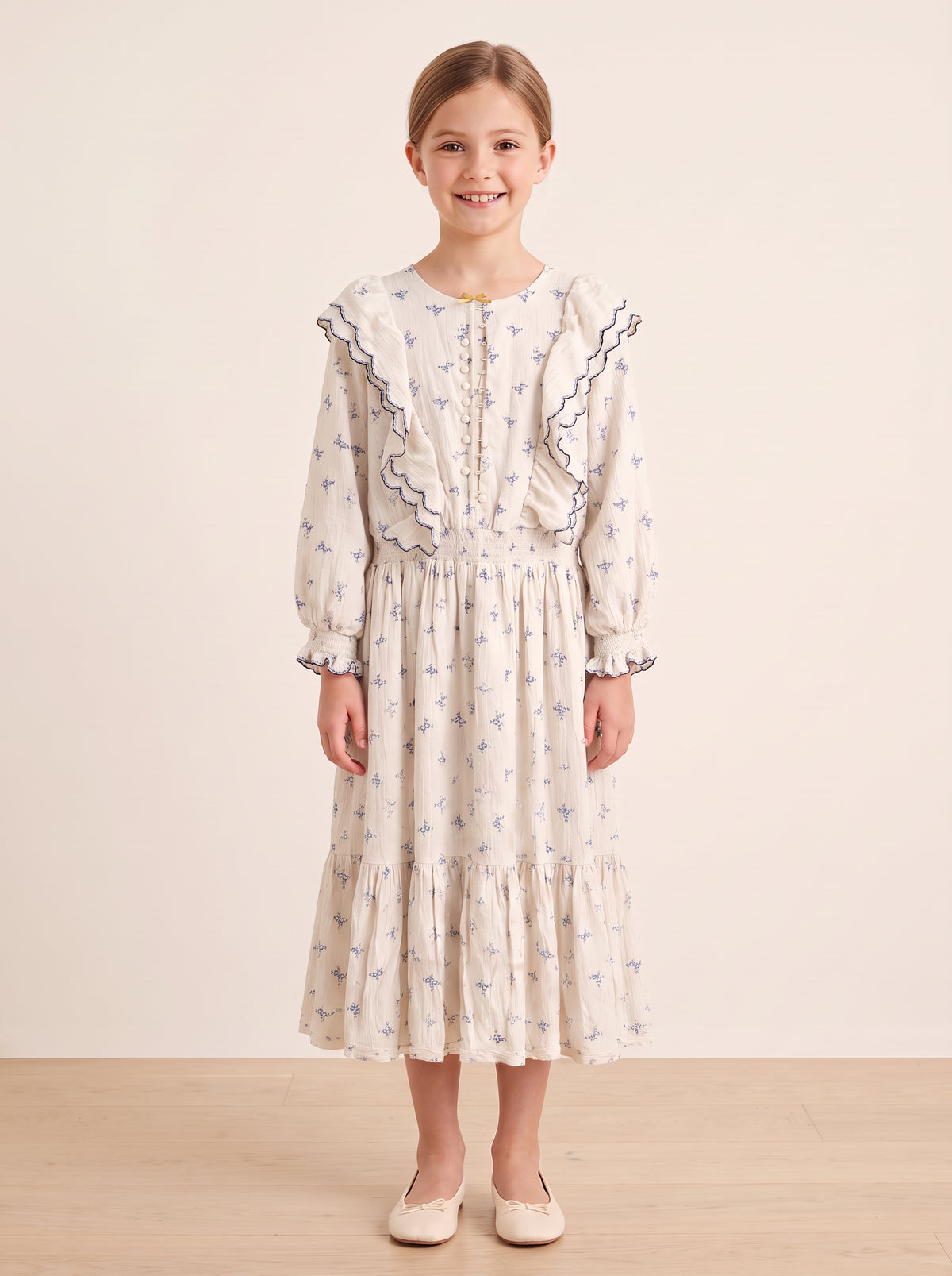Blue floral ruffled dress on a girl, knee-covering skirt