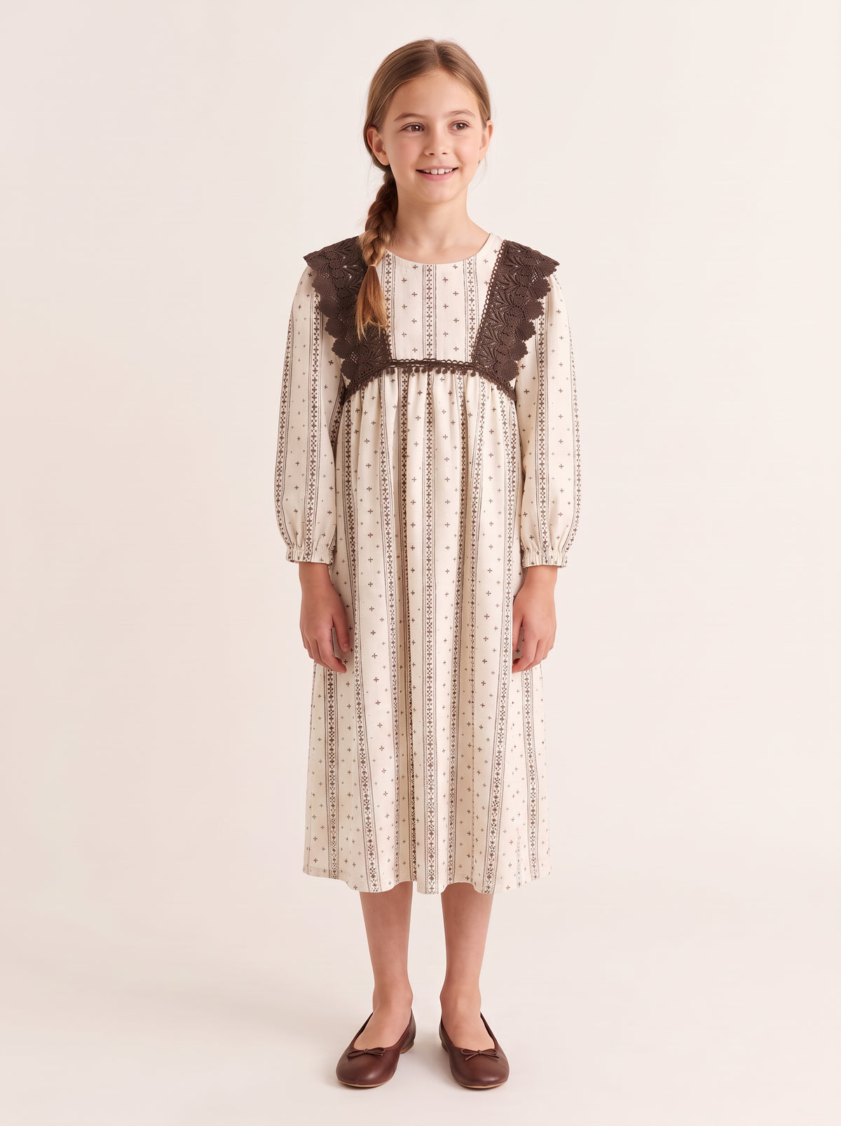 Striped crochet ruffle dress on a girl, knee-covering skirt