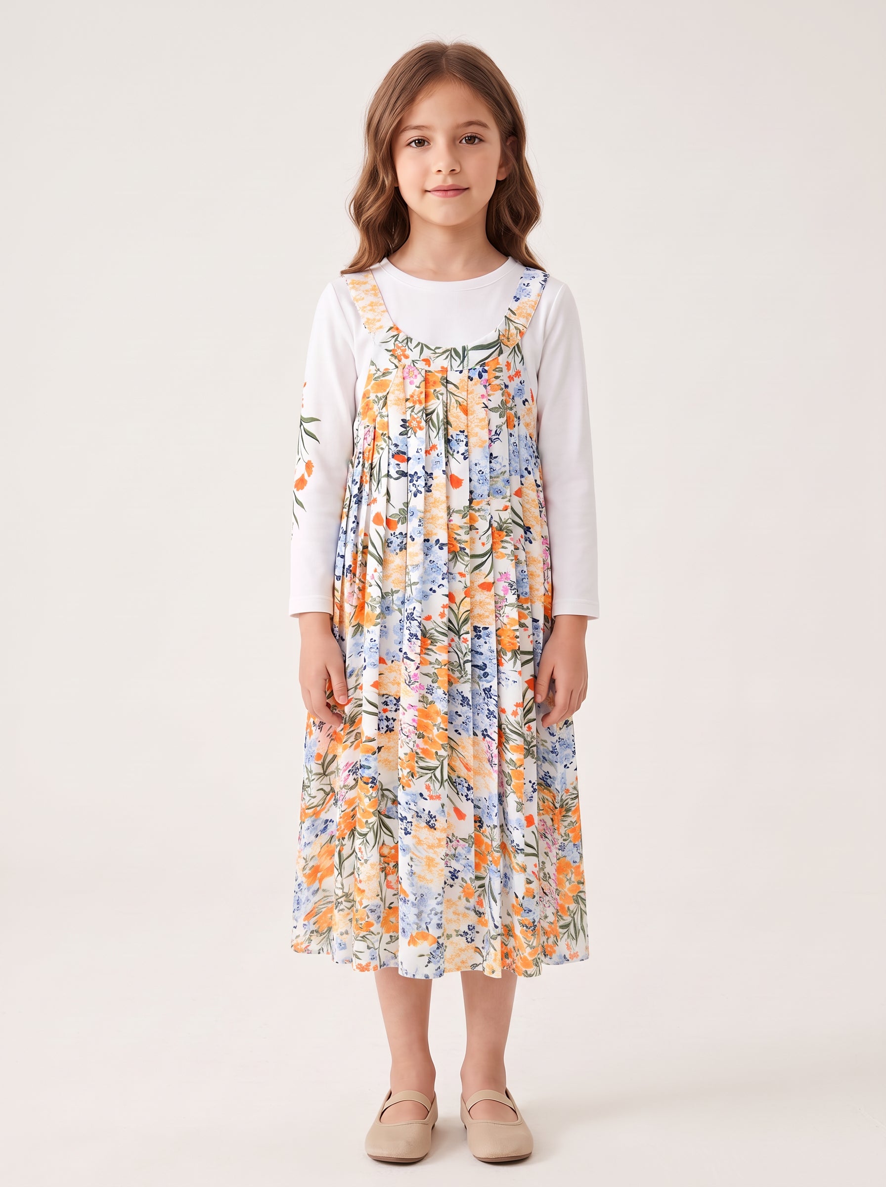 Floral jumper set on a girl, knee-covering skirt