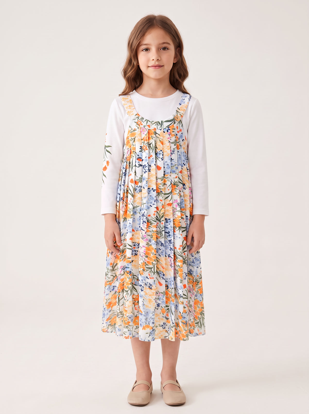 Floral jumper set on a girl, knee-covering skirt