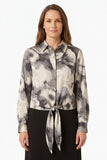 Gray feather-print tie-front blouse with pointed collar and long sleeves on a model